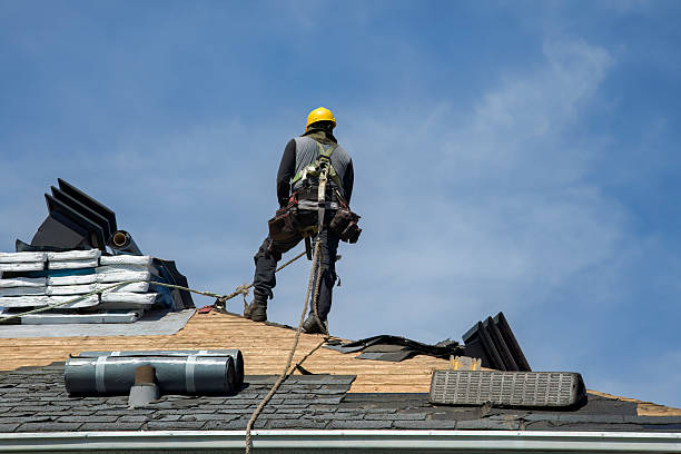 Professional Roof Replacement technician working in Ludlow, MA